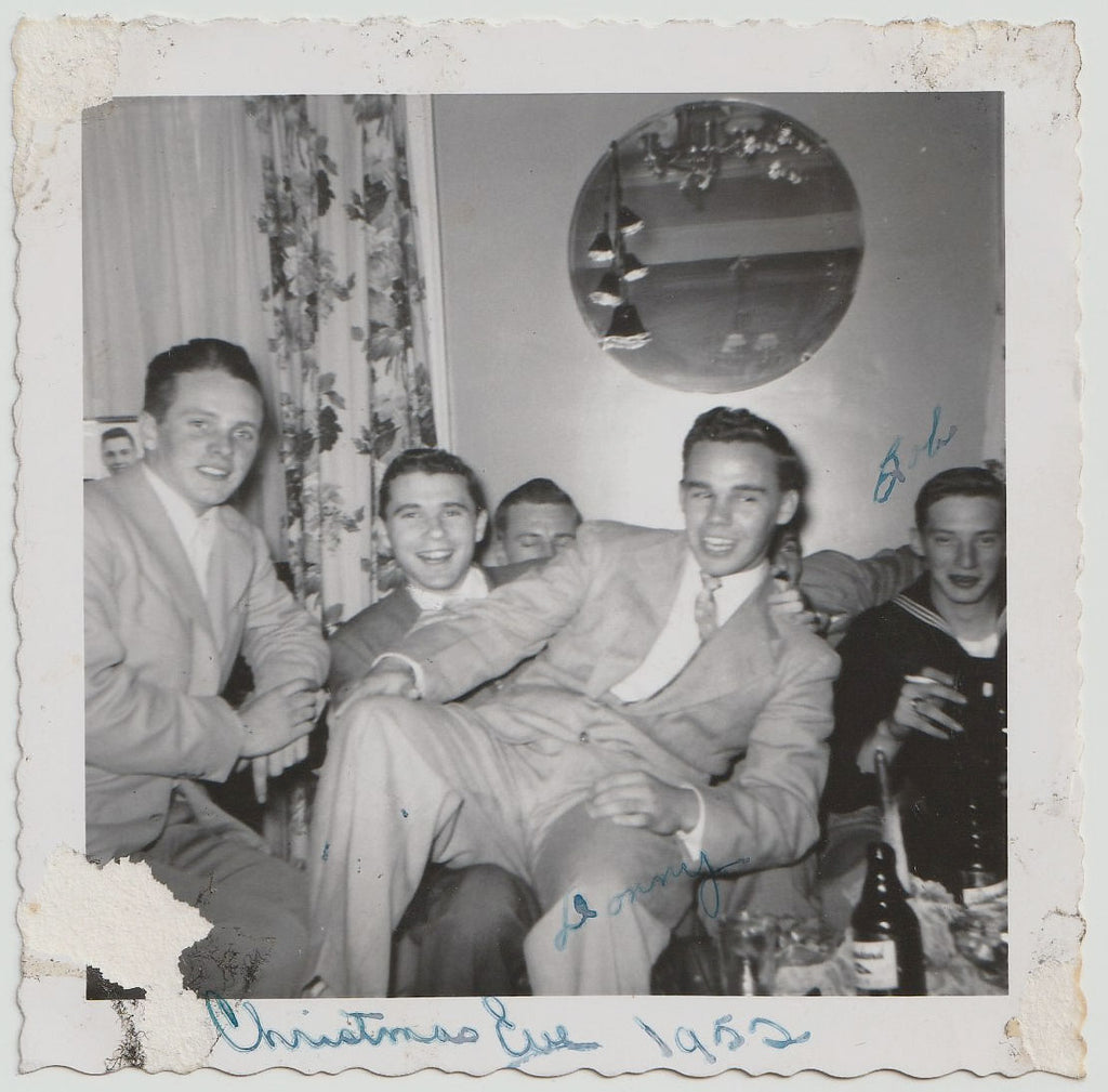 Having a gay old time at this all-male Christmas Party, 1952. Vintage snapshot.