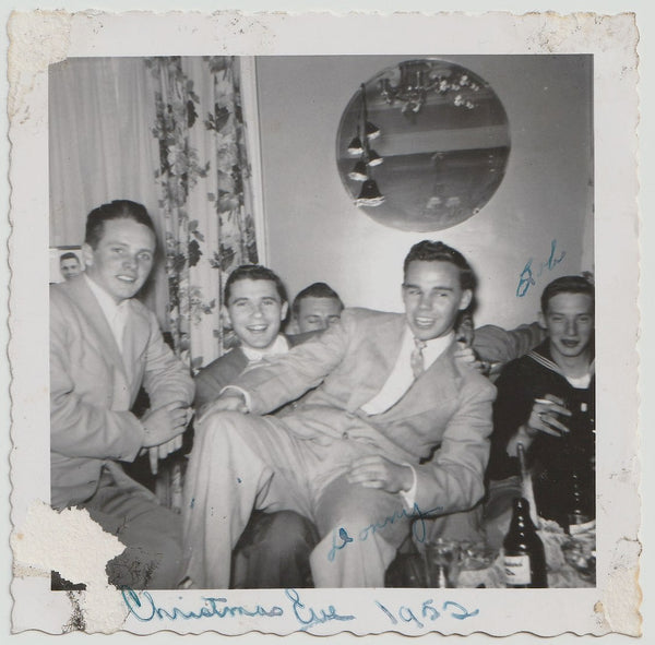 Having a gay old time at this all-male Christmas Party, 1952. Vintage snapshot.
