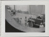 Interesting composition, likely the Port of New Orleans seen from above, centered on a muscular guy wearing shorts vintage snapshot