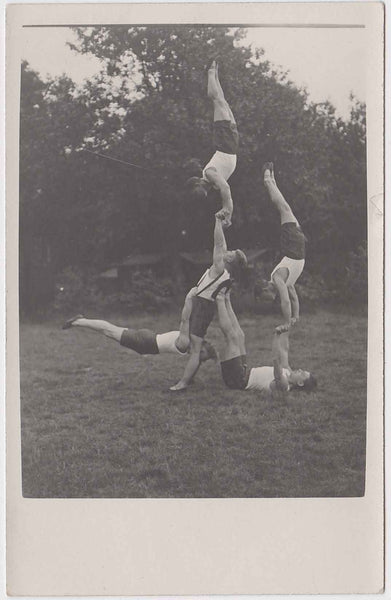 Five muscular young guys demonstrate their balancing skills vintage real photo postcard 1930s gay int
