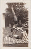 Vintage snapshot of two guys doing acrobatics in the front yard gay interest.