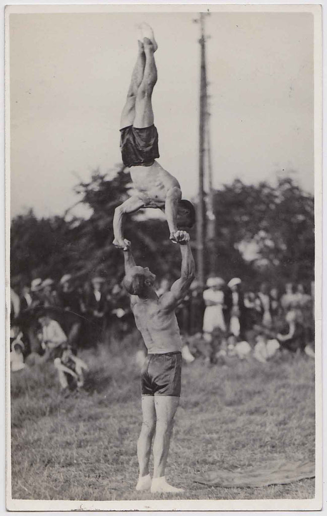 Hand Balancers Perform for an Audience vintage French real photo postcard