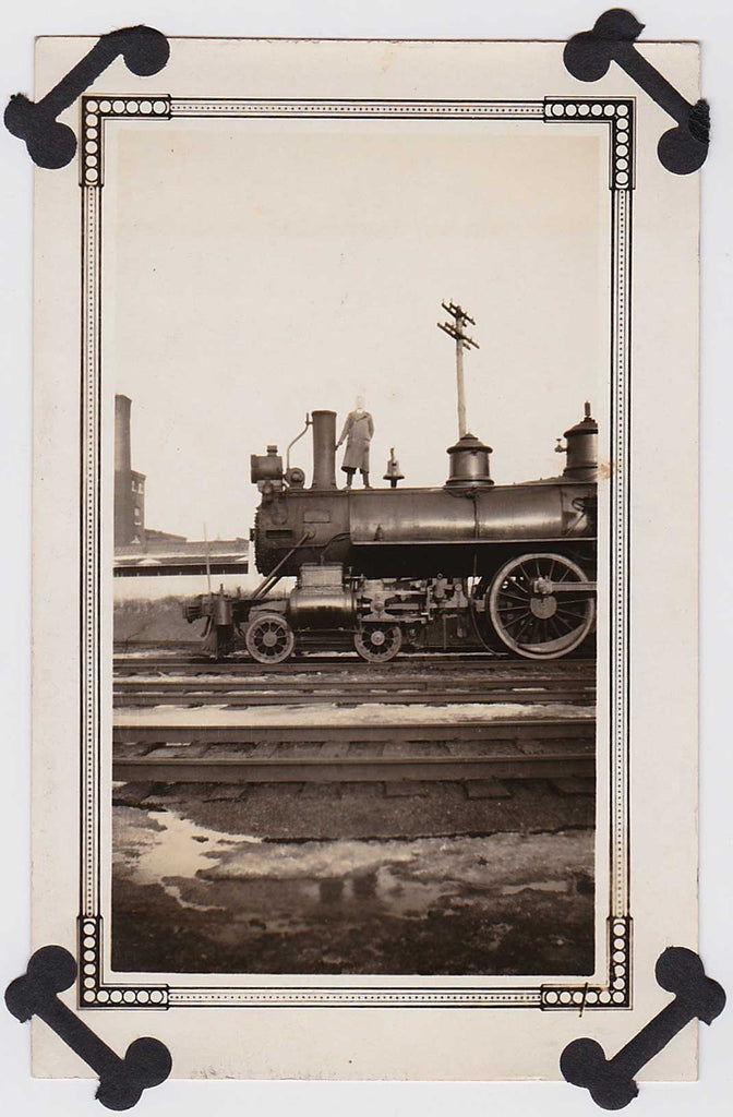 vintage snapshot Headless Man Standing on Train Engine