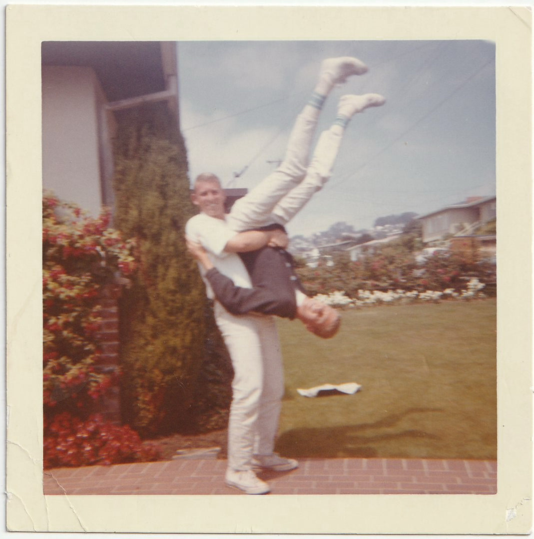 Holding Man Upside Down – Homobilia