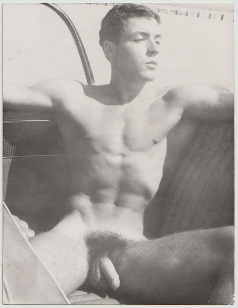 Jean Pierre Martin relaxing naked in the back seat of a car vintage physique photo by Barrington.