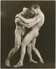 Rare vintage physique photo by John Graham of two models wrestling in posing straps. They're identified on the verso as "Steve & Roger."