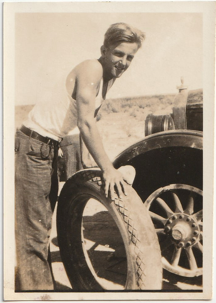 man-changing-tire_700x982.jpg?v=17393044