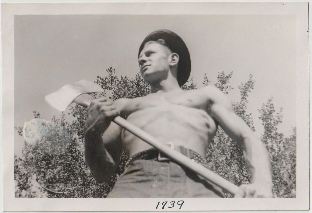 Vintage photo Kneeling view of a handsome and bare-chested man. Handwritten on verso: "Castaic, 1939."