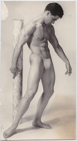 Muscular Bodybuilder in Posing Strap Touching Column, vintage physique photo