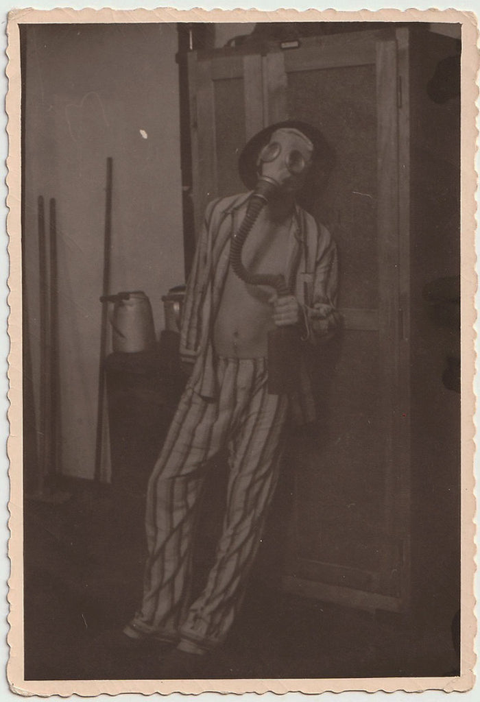 Man Wearing Pajamas and Gas Mask vintage photo