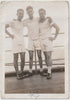 Vintage gay photo of affectionate sailors on deck, dated "49."