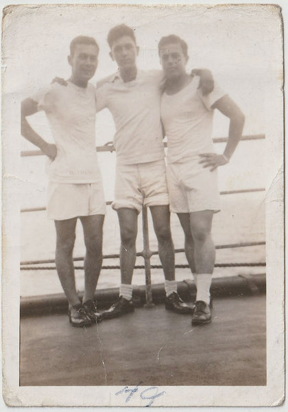 Vintage gay photo of affectionate sailors on deck, dated "49."