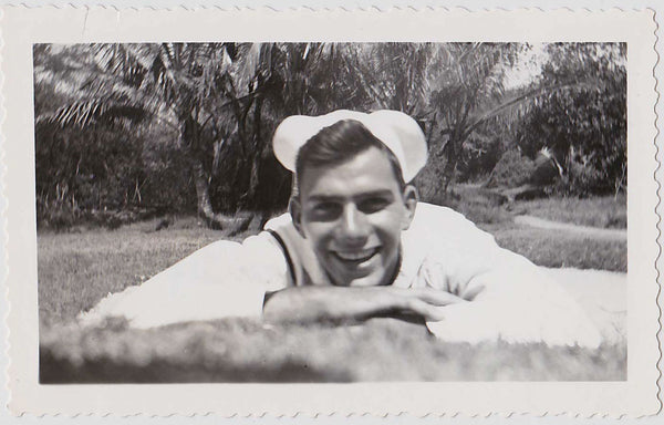 Worm's eye view of a handsome smiling sailor vintage gay snapshot