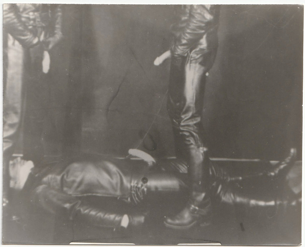 Vintage gay photo two leather guys standing over a third