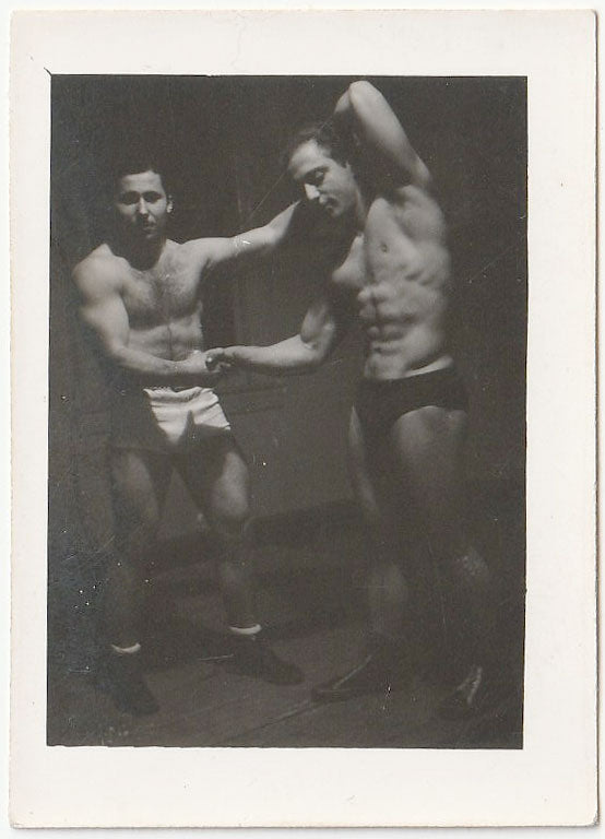 Two Bodybuilders Holding Hands  vintage physique photo