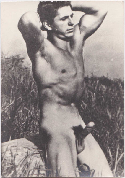 Vintage gay photo Handsome muscular male nude loving the outdoors.