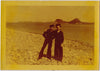 Two Affectionate Sailors on Rocky Beach vintage color photo