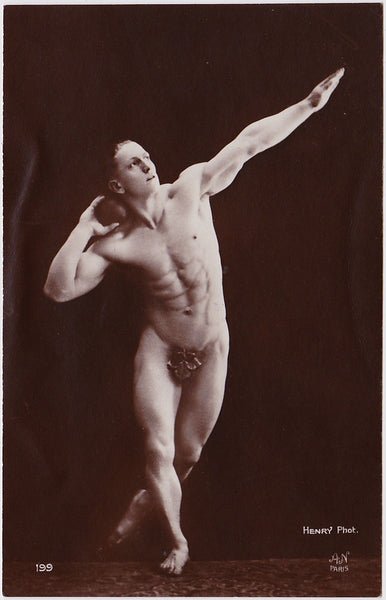 Handsome, muscular, strongman in an elegant and dynamic pose. Real Photo Postcard, Alfred Noyer Studio, Paris, 