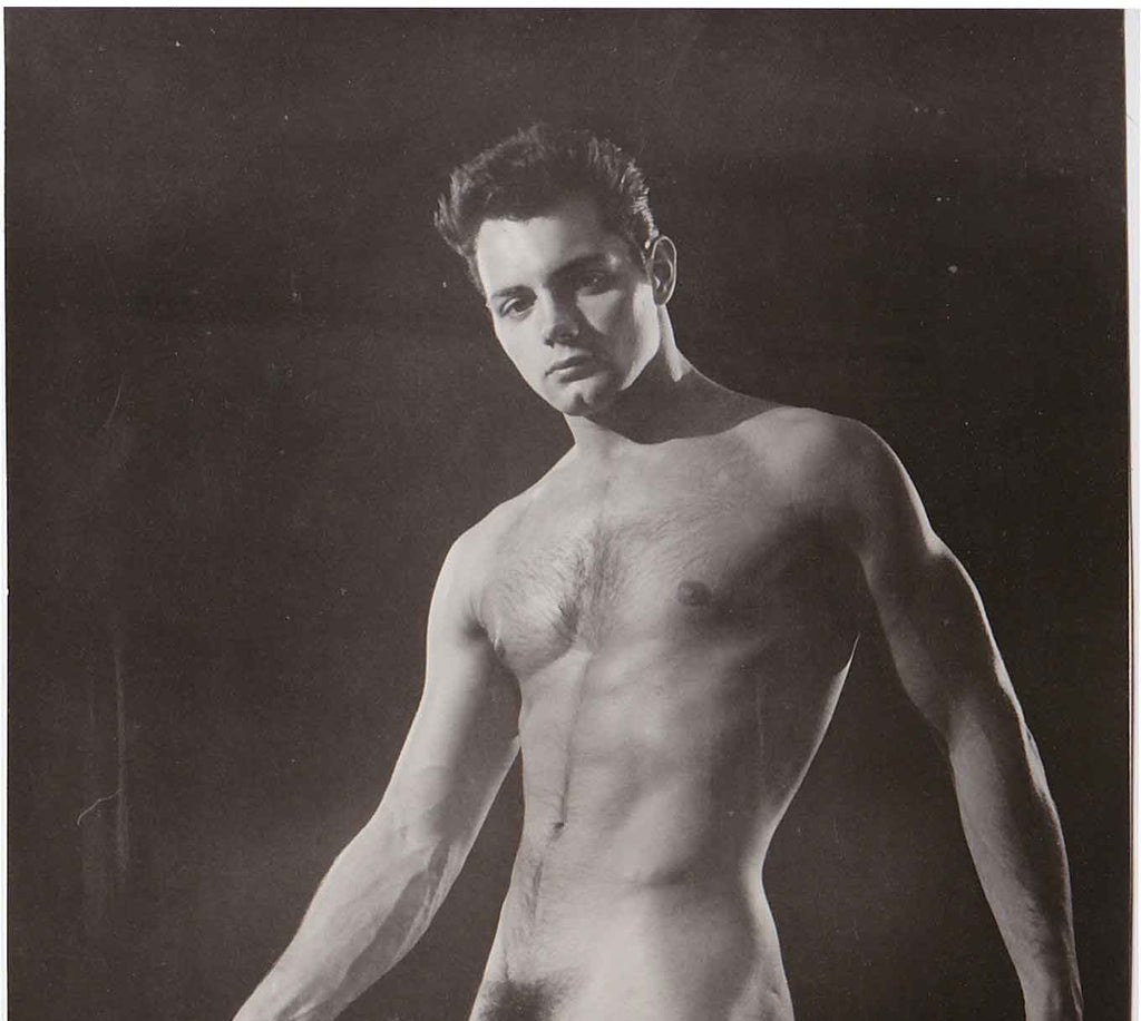 Anonymous vintage photo of a handsome nude model holding a foil. He is identified as Lou Marshall 22