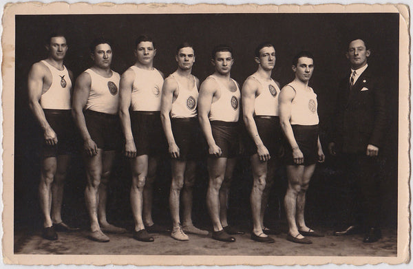 Vintage real photo postcard, Men in Rows wrestling team