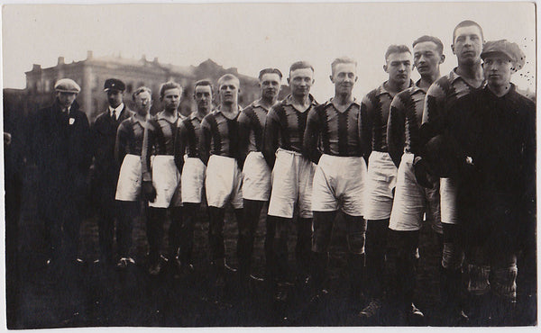 Vintage real photo postcard athletes in a row