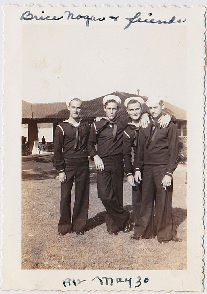Vintage sepia snapshot of four affectionate sailors identified in the top border as "Brice Nogar & friends"