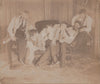 Reclining on a Divan: Men in Rows vintage cabinet card
