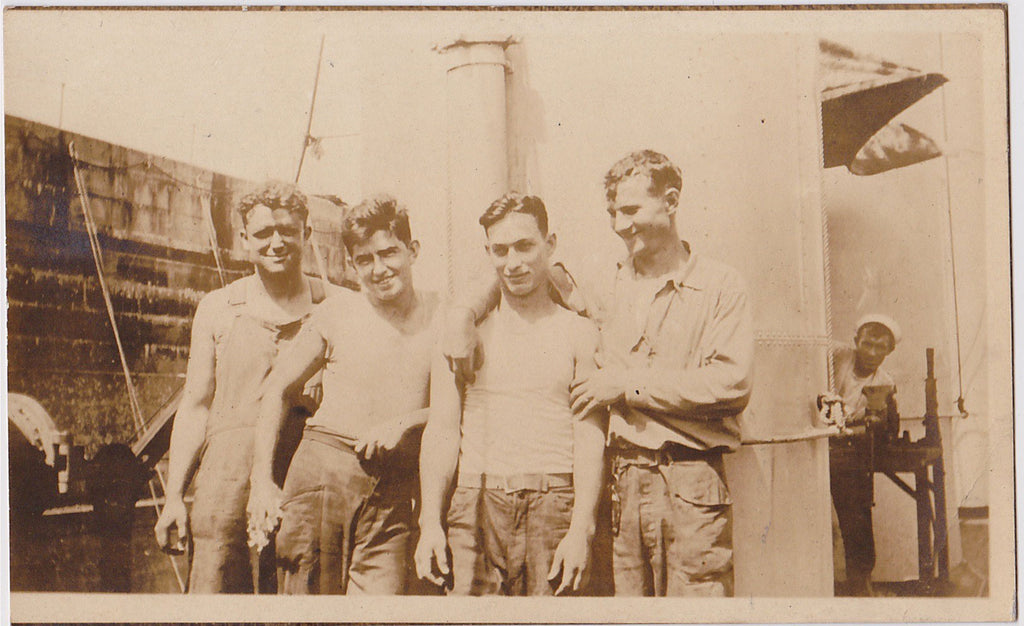 Four Buddies: Men in Rows vintage real photo postcard c. 1920s