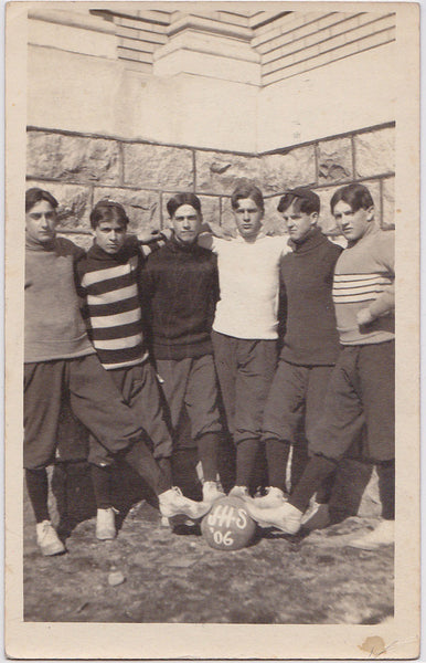 Vintage sepia Real Photo Postcard of six serious young men place their feet on a basketball. JHS '06
