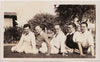 Reclining on the Lawn: Men in Rows vintage snapshot