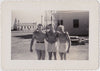 Vintage snapshot of three very beefy bodybuilders identified on verso