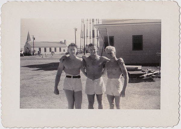 Vintage snapshot of three very beefy bodybuilders identified on verso