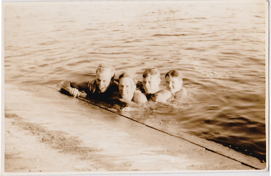 Four Men in the Water vintage snapshot