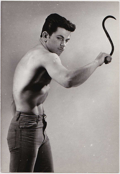 Rare original vintage photo of young Nils Anton raising an ice hook, by Stan of Sweden.