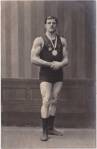 Athlete with Medals: Real Photo Postcard