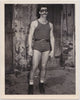 Early vintage photo by Bruce of Los Angeles: A sexy guy wearing a singlet and belt