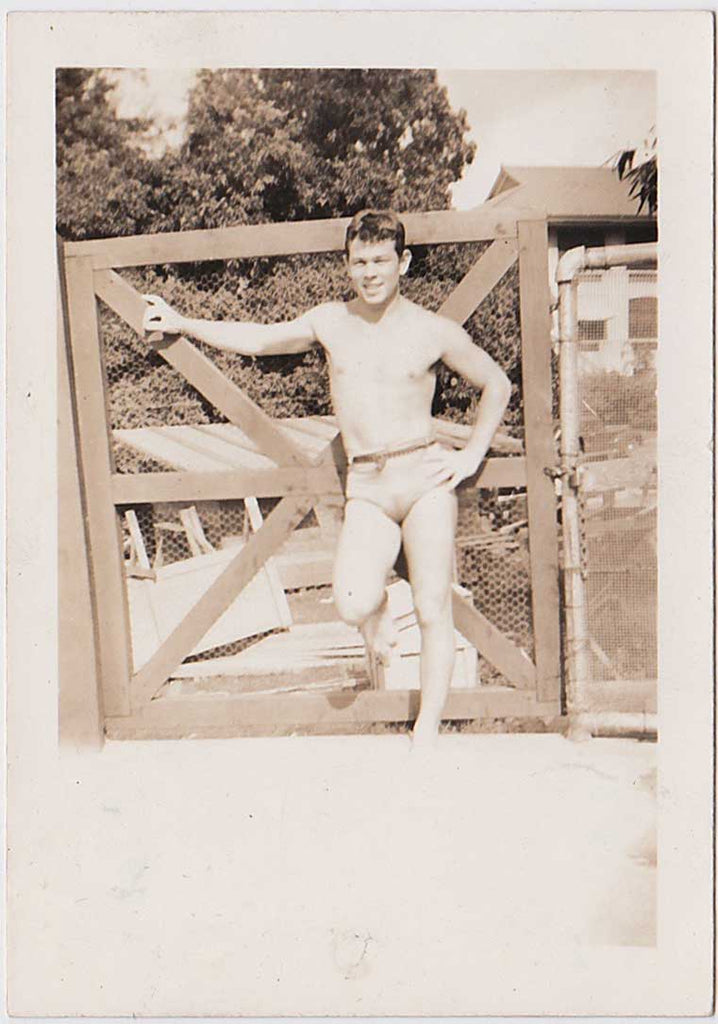 Handsome and muscular guy identified on verso as "Bud Reynolds" poses. Vintage gay photo