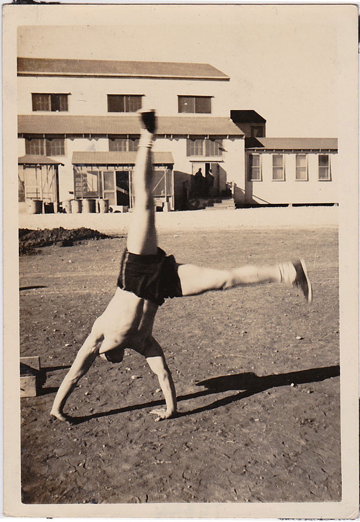 Anonymous Athlete Doing Cartwheel vintage sepia photo