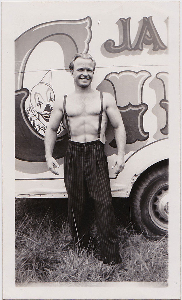 A handsome, smiling blond circus stud vintage physique photo