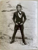 Vintage Men's Fashion photo dated 1972. Designer: Gloria Gross, London Skin-tight suit made of wool