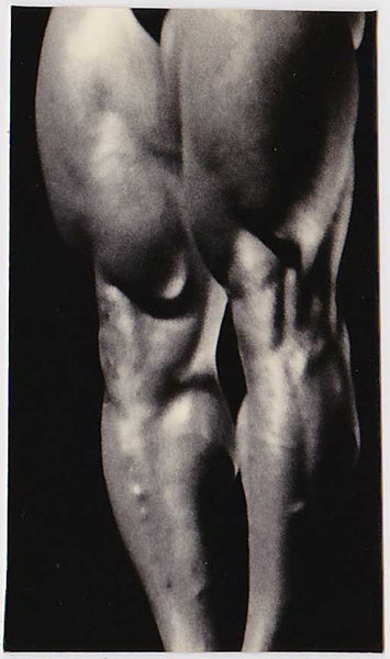Anonymous vintage photo of a bodybuilder's massive legs.