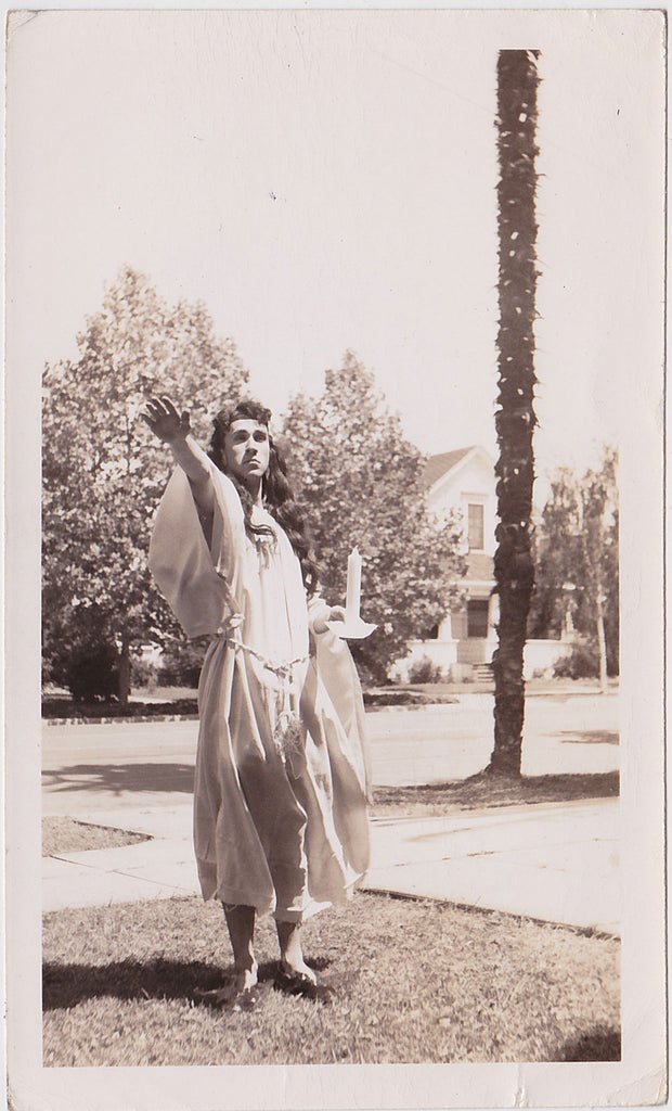 Man in Drag Holding Candle vintage sepia photo