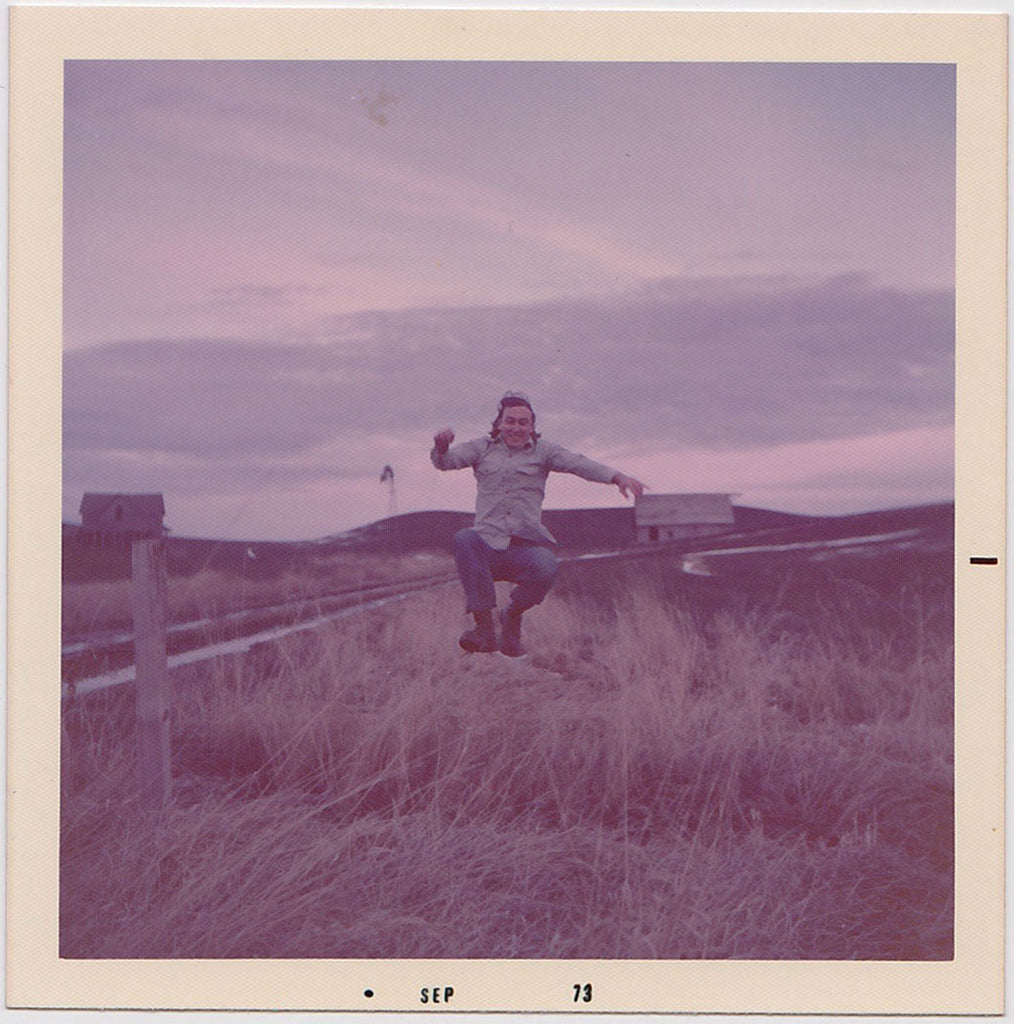 Man leaping over a ditch. Beautiful pale lavender color palette.  3 1/2" x 3 1/2" original vintage color print. 