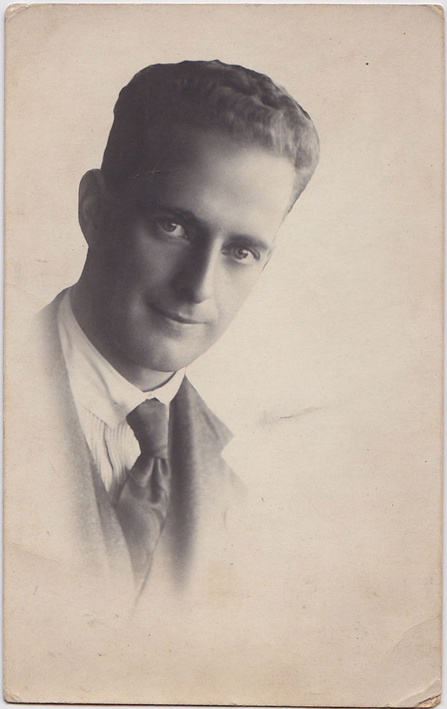 Handsome man with a kind expression, unusual composition. Australia c. 1923 Vintage real photo postcard