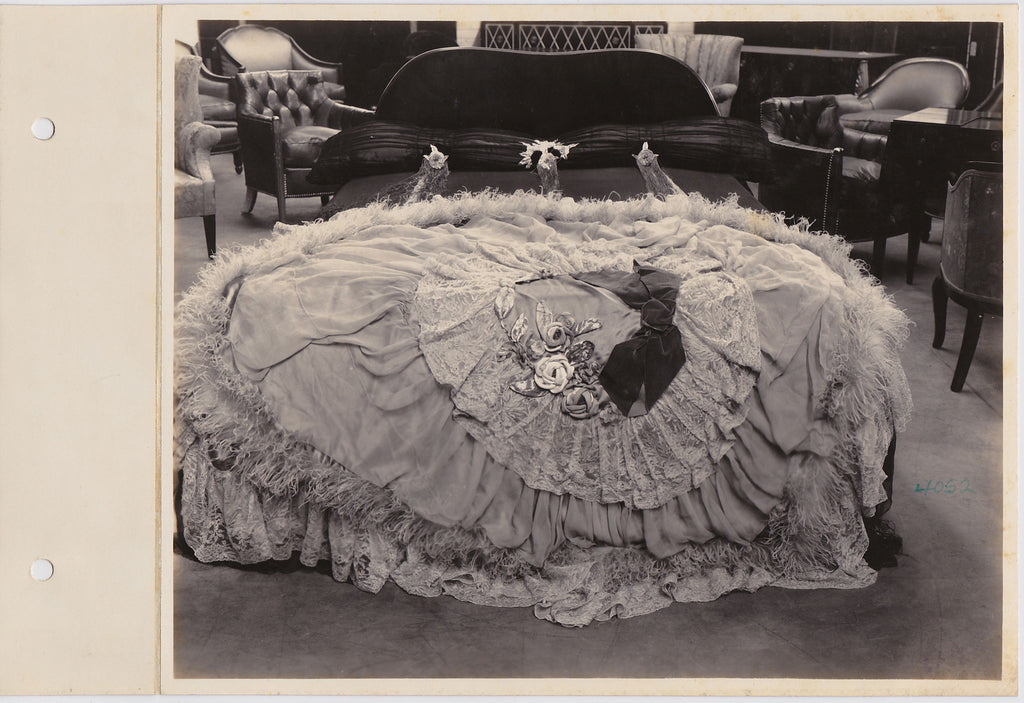 vintage photo It almost looks like an antebellum dress with marabou, lace, fabric roses and a giant velvet bow.