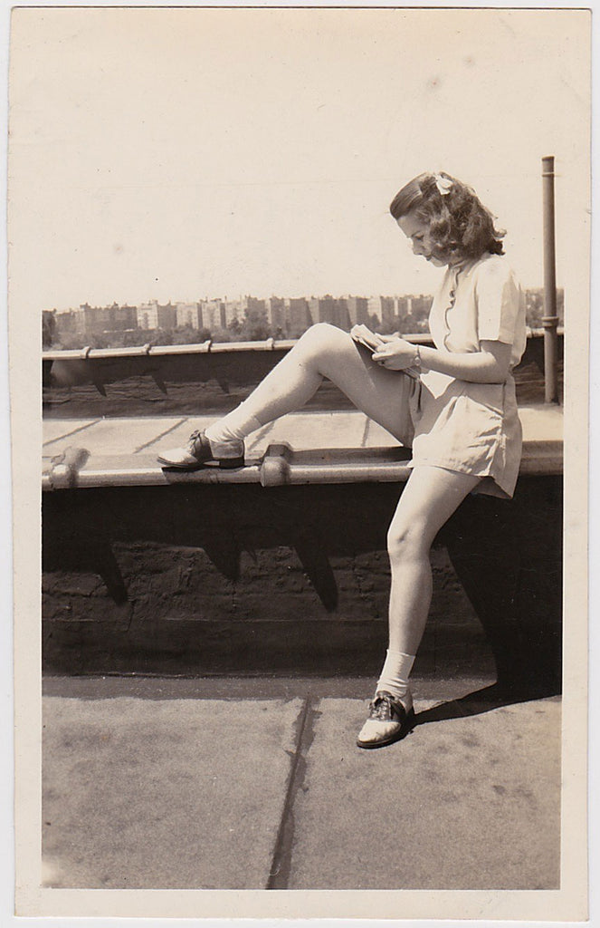 Woman Reading on Rooftop Vintage Photo