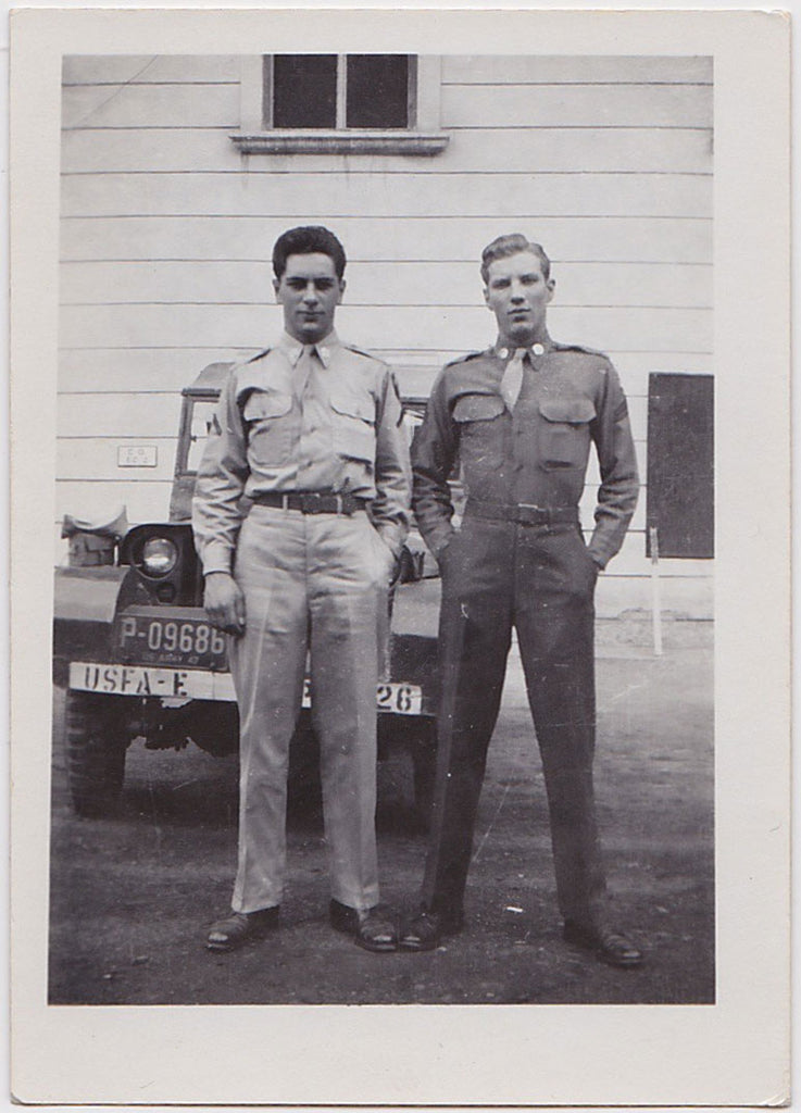 Two handsome GIs standing in front of their Jeep vintage gay photo