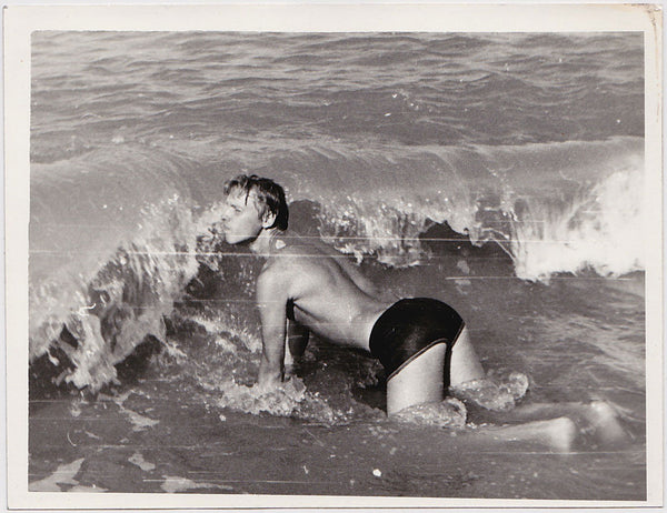 Anonymous Bodybuilder in the Surf vintage photo
