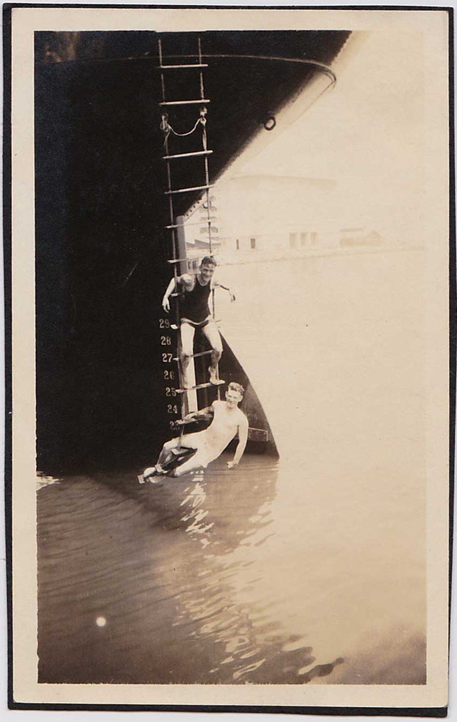 Two Men Dangling from Ship's Ladder: Vintage Snapshot