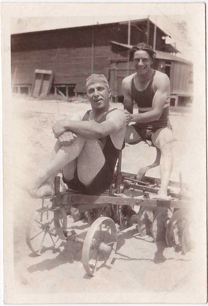 Two Men Sitting on Plow vintage gay photo